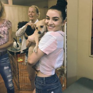 LV the Artist hold a dog