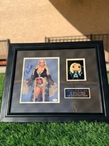 Charlotte Flair signed and authenticated 8x10 framed picture with Funko pop